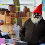 Darby Huffman of LaughinGnome Pottery, pictured at the Port Townsend Farmers Market, will welcome visitors to the new studio space he shares with partner Francie Loveall this Friday evening during the First Friday Speaker Series program. (Diane Urbani de la Paz/Peninsula Daily News)