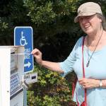 Kate Kinney of Port Townsend turns in her ballot from the primary election at the dropbox in front of the Jefferson County Courthouse on Tuesday afternoon. Results of Tuesdays primary election are posted online at cmg-northwest2.go-vip.net/peninsuladailynews and will be explored in depth in Thursdays print edition. (Zach Jablonski/Peninsula Daily News)