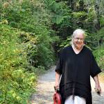 Artist Sara Mall Johani, pictured outside her workshop in Chimacum, will present her new book, "Mine, Yours, Nobody's: My Story of Wild Olympic Salmon," at the Jefferson Museum of Art & History this Saturday. (Diane Urbani de la Paz/Peninsula Daily News)