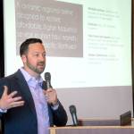 Clint Ostler, president of Dash Air Shuttle, speaks about starting air service between Port Angeles and Seattle-Tacoma International Airport during a Port Angeles Chamber of Commerce luncheon. (Keith Thorpe/Peninsula Daily News)