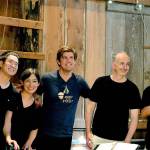 Following the Takács Quartets performance Sunday in the barn at Trillium Woods Farm, Music on the Strait co-artistic directors Richard ONeill, far left, and James Garlick, center, take a breather. With them are quartet violinists Harumi Rhodes and Edward Dusinberre and cellist András Fejér. (Diane Urbani de la Paz/Peninsula Daily News)