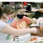 Jasmine Paul, 9, left, and John Hall, 10, put together a habitat diorama in which animals might live in nature after gathering materials in Webster's Woods at Port Angeles Fine Art Center. The diorama is just one of many projects and games students will participate in this week as part of art camps at the center, which is hosting two weeks of camps focusing on different ways in which science and art intersect. This week's half-day sessions are focused on Nature Art Camp and Treasure Map and Geocache. Next week's camps, The Art of Science Journals and Sculpture Design for Kids, are full, but students can be placed on a waiting list. Registration for a session is $100 for arts center members and $120 for non-members. For more information, visit www.pafac.org/summercamp.html or email rachel@pafac.org.