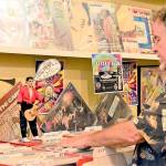 Port Townsend Record Show organizer Chuck Moses, who works at Magpie Alley downtown, is preparing for the show Saturday at the American Legion Hall. (Diane Urbani de la Paz/Peninsula Daily News)