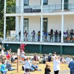 Performer and teacher Kristin Smith, standing on the grass, is among the faculty members hosting a free concert by the YEA Music students this Friday at Fort Worden State Park. (Diane Urbani de la Paz/Peninsula Daily News)