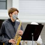 Alto saxophonist Elijah Hill, 15, of Port Townsend didnt let his mask interfere with playing in the YEA Music! Camp finale concert, which drew about 100 listeners to Fort Worden on Friday. (Diane Urbani de la Paz/Peninsula Daily News)