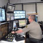 Deputy Rick Bray watches surveillance monitors from the control room at the Clallam County Jail on Wednesday in Port Angeles. (Keith Thorpe/Peninsula Daily News)