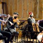 The barn at Trillium Woods Farm near Quilcene is the setting for free chamber concerts this summer, including last Sundays performance by, from left, James Garlick, Richard ONeill, Jeremy Denk and Ani Aznavoorian. This weekend will bring the final Concerts in the Barn at 2 p.m. Saturday and Sunday. Patrons who sit inside the barn must show proof of vaccination. (Diane Urbani de la Paz/Peninsula Daily News)