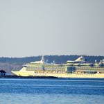 The 961-foot Serenade of the Seas skirts Point Wilson on its way from Seattle to Alaska. The Royal Caribbean ship, which holds 2,578 passengers, also passed Port Angeles and Sekiu en route to its first stop in Sitka today. (Diane Urbani de la Paz/Peninsula Daily News)