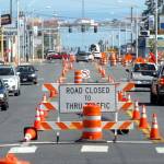 Keith Thorpe./Peninsula Daily News
Traffic makes its way through a gauntlet of orange cones and barrels on Tuesday as part of a safety enhancement prioject on South Lincoln Street in Port Angeles. The state-funded project is intended to improve pedestrian and bicycle safety along the half-mile corridor between East First and Eighth streets. It includes upgraded pedestrian crossings and installation of a new traffic light at Third Street. The project is expected to be completed by the end of the year.