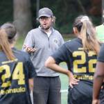 Peninsula College women's soccer coach Kanyon Anderson addresses his team at the NWAC Friendlies at Starfire Sports Complex in Tukwila on Wednesday. (Rick Ross/Peninsula College Athletics)