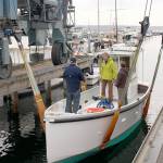 The Clean Bay is an all electric, zero-emission work boat built by students of the School, that will be based out of Port Ludlow Bay, to provide free pump out services to recreational mariners. (Zach Jablonski/Peninsula Daily News)