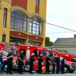 Saturday at 8:46 a.m., East Jefferson Fire & Rescue and Port Townsend Police Department crew members bowed their heads for one minute of silence. A brief ceremony outside the EJFR station at Lawrence and Harrison streets honored the first responders who served at the sites attacked on Sept. 11, 2001. (Diane Urbani de la Paz/Peninsula Daily News)