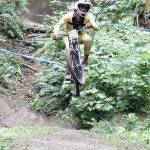 Blake Nelson of Wenatchee, wearing a Santa cap, flies down the course at Dry Hill on Sunday. Nelson finished second in the 30-39 age bracket. (Dave Logan/for Peninsula Daily News)