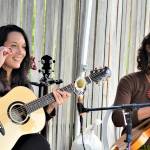 Micaela Kingslight, left, and Samara Jade are two-thirds of Three Wheels Turning, pictured during their May gig at the Keg & I in Chimacum. The trio, which also includes Aimée Ringle, will play from 6 p.m. to 8 p.m. this evening at Finnriver Farm & Cidery in Chimacum. (Diane Urbani de la Paz/Peninsula Daily News)