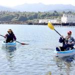 Dave Logan/For Peninsula Daily News 
Sue and Tom Lotz of Port Angeles take what they call a coffee break in their small kayaks near Sail and Paddle Park on Ediz Hook on Thursday. They were enjoying the last days of nice weather before a predicted rain storm expected this weekend. The Lotzes said they were greeted by at least a dozen seals in the harbor on their leisurely excursion.