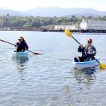 Dave Logan/For Peninsula Daily News 
Sue and Tom Lotz of Port Angeles take what they call a coffee break in their small kayaks near Sail and Paddle Park on Ediz Hook on Thursday. They were enjoying the last days of nice weather before a predicted rain storm expected this weekend. The Lotzes said they were greeted by at least a dozen seals in the harbor on their leisurely excursion.