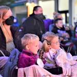In the front row for the Port Townsend Film Festivals outdoor cinema Friday night were Coraline, 6, and Kadence, 3, along with their mother, Dr. Molly Force of Port Townsend. Diane Urbani de la Paz/Peninsula Daily News
