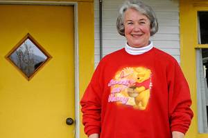 Every few months, Cathie Osborne will meet with her doctor at Swedish Medical Center via Zoom and, with a magnet and cell phone, her treatment for essential tremor can be adjusted remotely by medical staff in Seattle without making an all-day trip. Knowing we dont have to make those trips is such a relief, she said. (Matthew Nash/Olympic Peninsula News Group)=