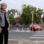 JoVonne Lingvall stands by a new pedestrian crosswalk at St. Josephs Catholic Church where she and her sister were struck by a vehicle last November. Lingvall survived, but her sister Lorraine (Reandeau) Anderson died four days later. (Matthew Nash/Olympic Peninsula News Group)