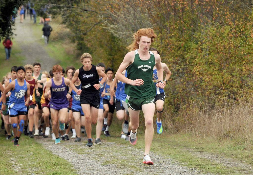 Port Angeles junior Jack Gladfelter won his third straight Olympic League cross-country meet in a race held Wednesday at Voice of America at Dungeness Recreation Area.
(Michael Dashiell/Olympic Peninsula News Group)