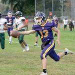 Steve Mullensky/for Peninsula Daily News


Ranger Kevin Alejo extends the ball over the plane of the goal line for a touchdown during a Thursday afternoon game home game against the Muckleshoot Kings.