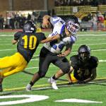 Courtesy Lisa Jensen East Jefferson senior Anson Jones shrugs off a Vashon defender during the Rivals 19-0 victory Friday. Jones scored a rushing touchdown in the win.