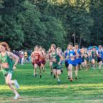 Rodger Johnson photo
Port Angeles' Jack Gladfelter, far left, leads the pack at an Olympic League 2A cross-country meet in Bremerton on Wednesday. Gladfelter won the boys' race while Sequim's Riley Pyeatt won the girls' race.