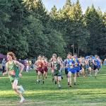 Rodger Johnson photo Port Angeles Jack Gladfelter, far left, leads the pack at an Olympic League 2A cross-country meet in Bremerton on Wednesday. Gladfelter won the boys race while Sequims Riley Pyeatt won the girls race.
