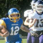 Keith Thorpe/Peninsula Daily News
Crescent's Wyatt Lee, left, tries to outrun Quilcene's Kevin Alejo, front, and  Max Budnek on Thursday in Joyce.
