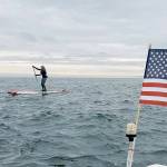 Hannah Nelson of Port Angeles crossed the Strait of Juan de Fuca on a paddleboard to raise money for domestic violence services. (Laura Hall)