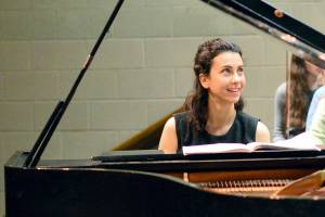 Bulgarian-born pianist Anna Petrova, rehearsing with the Port Angeles Symphony the last time she came to the North Olympic Peninsula, will return to open the orchestras new season Nov. 6. (Diane Urbani de la Paz/Peninsula Daily News)