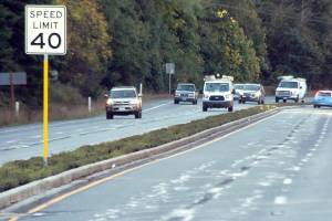Keith Thorpe/Peninsula Daily News
Traffic on U.S. Highway 101 at Morse Creek east of Port Angeles travels on Wednesday next to recently-planted, dought-resistant shrubs in the traffic median.