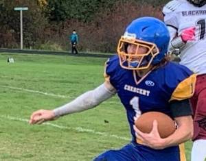 Crescent's Weston Hart (1) runs for yardage against Lummi on Saturday. Crescent was down just one touchdown to the No. 2-ranked Blackhawks early in the fourth quarter. (Courtesy photo)