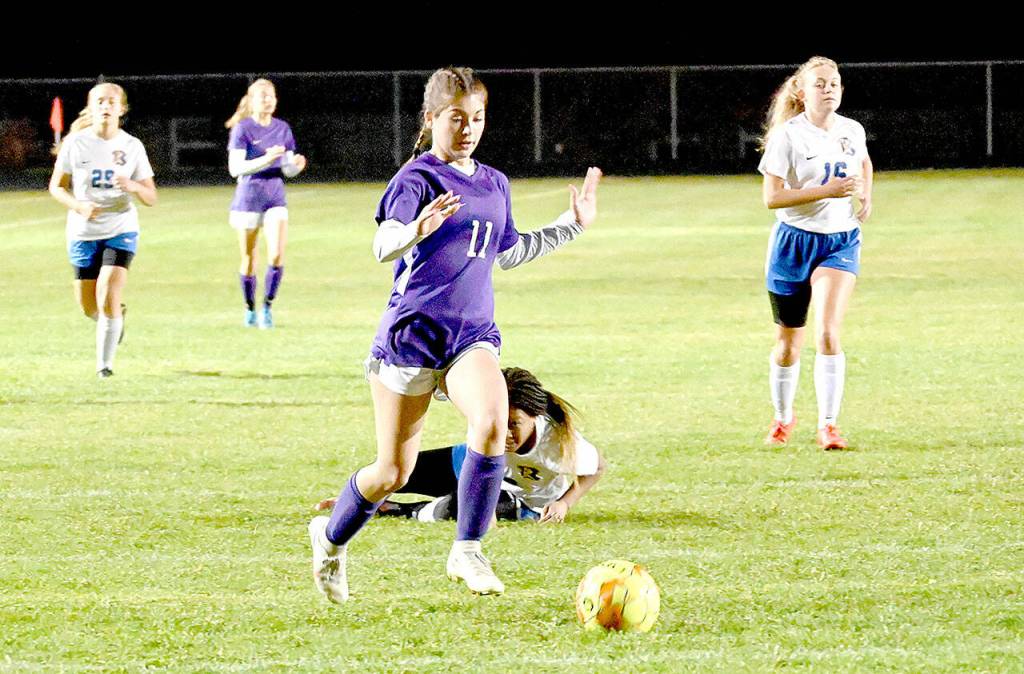 Sequims Alliyah Weber breaks through the Bremerton defense for a second half score in the Wolves 6-0 win over the visiting Knights on Tuesday. (Michael Dashiell/Olympic Peninsula News Group)