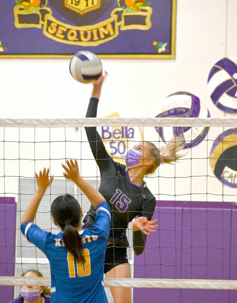 Sequims Kendall Hastings goes up for a kill against Bremerton on Tuesday. The Wolves won the match 3-0. (Michael Dashiell/Olympic Peninsula News Group)