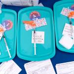FILE - In this May 19, 2021 file photo, Pfizer COVID-19 vaccine doses are prepared for members of the community 12 years and up, at a clinic held by Community of Hope, outside the Washington School for Girls in southeast Washington. Kids aged 5 to 11 will soon be able to get a COVID-19 shot at their pediatrician’s office, local pharmacy and potentially even their school. The White House is detailing plans Wednesday for the expected authorization of the Pfizer shot for younger children in a matter of weeks.  (AP Photo/Jacquelyn Martin, file)