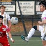 Keith Thorpe/Peninsula Daily News
Peninsula's Jeong Hyun Kang, right, gets in a high kick as Skagit Valley's Sergio Garduno Mendez, left, and teammate Christopher Dominguez look on during Wednesday's match in Port Angeles.