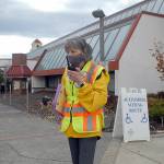 Ham radio operator Kathleen Reiter, training coordinator for Amateur Radio Emergency Services, relays radio messages outside the county courthouse during Thursdays Great ShakeOut, an international drill to practice how to drop, cover and hold in the event of an earthquake. In Clallam County, numerous schools and other agencies practiced what to do in an emergency. Included in the drill was the sounding of tsunami sirens across the state. (Keith Thorpe/Peninsula Daily News)