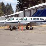 Three Dash Air Shuttle Cessna 403C aircraft sit parked at William R Fairchild International Airport on Aug. 31 as they await entering into scheduled service between Port Angeles and SeaTac Airport. (Keith Thorpe/Peninsula Daily News)
