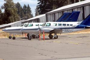 Three Dash Air Shuttle Cessna 403C aircraft sit parked at William R Fairchild International Airport on Aug. 31 as they await entering into scheduled service between Port Angeles and SeaTac Airport. (Keith Thorpe/Peninsula Daily News)