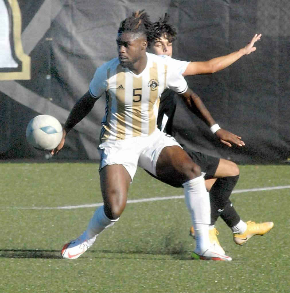 Peninsulas Dylan Pauw, front, cuts off Everetts Nacho Pedrosa during Saturdays match in Port Angeles. (Keith Thorpe/Peninsula Daily News)