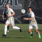 Peninsulas Tim Deser, left, and Fernando Tavares try to control a loose ball as Everetts Axel Rochel follows behind on Saturday in Port Angeles. (Keith Thorpe/Peninsula Daily News)