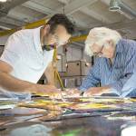 Artists Tim Carey, left, and Narcissus Quagliata collaborate on the largest stained glass creation in the world in Holy Frit, the Port Townsend Film Festival Pic available for streaming this week. (Kyle J. Mickelson/Judson Studios)