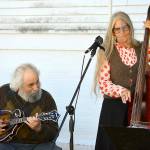 David Grisman, beside his artist and musician wife Tracy Bigelow Grisman, has contributed a private mandolin lesson to the Northwind Auction online now. Grisman, known as the "Paganini of the mandolin," includes his music books, "Dawg Grass," "Dawg Latin," "Dawg Jazz" and "Dawg Roots."  Diane Urbani de la Paz/Peninsula Daily News