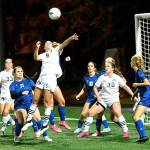 Peninsula College women battle for a ball in the box in front of the Clark goal in Sunday's NWAC soccer championship game. From left are Peninsula players Tommylia Dunbar, Cerese McMillian (33), Kascia Muscutt (5) and Addy Becker (30). (Jay Cline/Peninsula College)