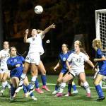 Peninsula College women battle for a ball in the box in front of the Clark goal in Sundays NWAC soccer championship game. From left are Peninsula players Tommylia Dunbar, Cerese McMillian (33), Kascia Muscutt (5) and Addy Becker (30). (Jay Cline/Peninsula College)