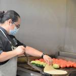 In her tiny La Cocina kitchen in Port Townsend, executive chef and owner Lissette Garay makes a variety of specialties from scratch, including fresh tortillas. (Diane Urbani de la Paz/Peninsula Daily News)