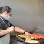 In her tiny La Cocina kitchen in Port Townsend, executive chef and owner Lissette Garay makes a variety of specialties from scratch, including fresh tortillas. (Diane Urbani de la Paz/Peninsula Daily News)
