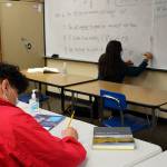 Wendy Sampson teaching Klallam language as student Antonio Martinez takes notes. This year, Wendy took a teaching position in the Port Angeles School District to continue the work of her predecessor and mentor, Jamie Valadez, teaching Klallam language.