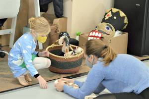 Port Townsend Ballet teacher Krystal Kennedy shows student Soleil Robinson, 6, her toe shoes after class Tuesday afternoon. In the PTBs The Nutcracker next week, Kennedy will dance the roles of the Snow Queen and Dew Drop Fairy. (Diane Urbani de la Paz/Peninsula Daily News)
